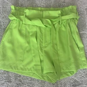 Never work lime green high waisted shorts !